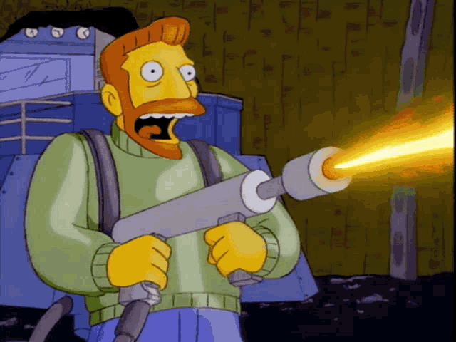 A gif of supervillain Hank Scorpio laughing maniacally as he seizes the East Coast